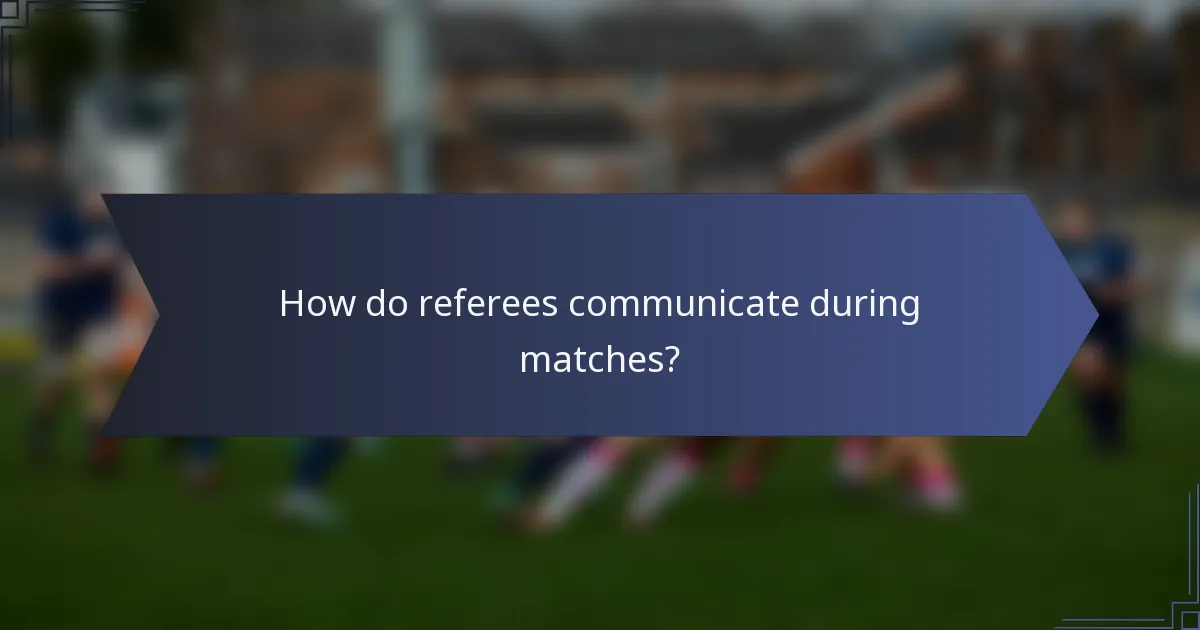 How do referees communicate during matches?